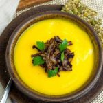 Butternut Squash Soup with Ginger and Orange garnished with crispy shallots