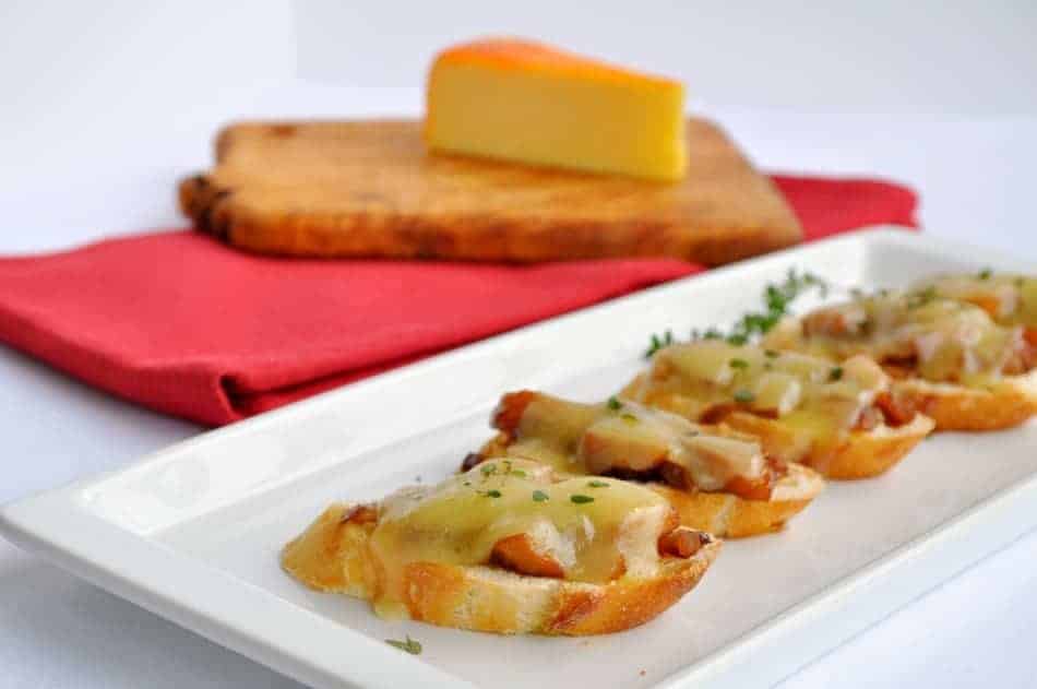 Caramelized Onion, Apple and Cheese Crostini.Not your everyday Grilled Cheese! An easy make-ahead appetizer. www.flavourandsavour.com