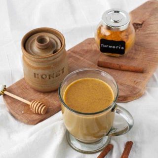 Warm Turmeric Cinnamon Milk with honey