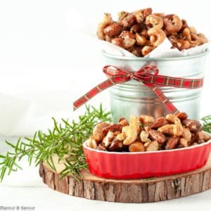 Sweet and Spicy Rosemary Nuts in a tin and in a red serving dish