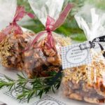 Sweet and Spicy Rosemary Nuts wrapped in gift bags.