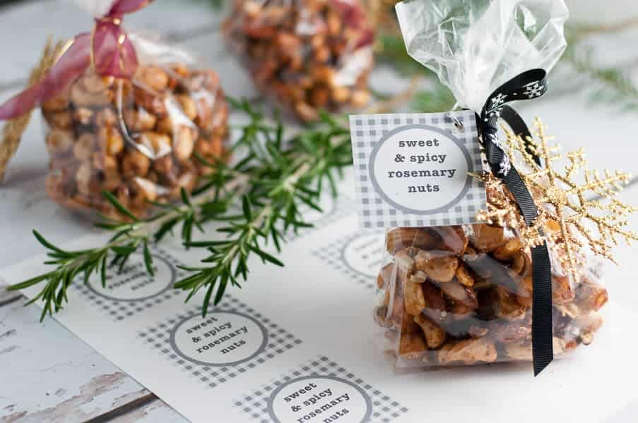 sweet and spicy rosemary nuts wrapped in small packages and tied with a ribbon and a label