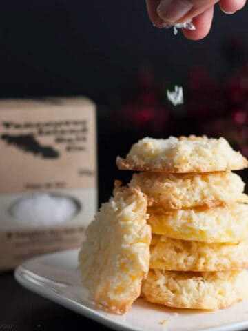 stack of coconut cookies with flaky sea salt