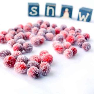 Showstopper Sparkling Sugared Cranberries. So simple! Just 3 ingredients! Top a cheesecake, decorate a cocktail, add to an appetizer.