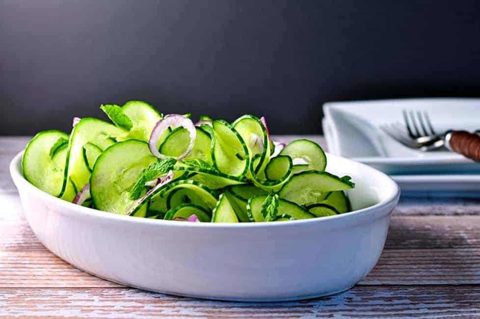 Cucumber Mint Salad with Spicy Thai Dressing. "Last-minute" salad. Crunchy cucumbers, aromatic mint and a perfectly balanced Thai dressing. |www.flavourandsavour.com