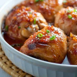 This Asian Glazed Garlic Chicken features tender, juicy chicken thighs glazed with an Asian-inspired sauce. It has a little heat and hints of garlic, sesame and ginger. |www.flavourandsavour.com