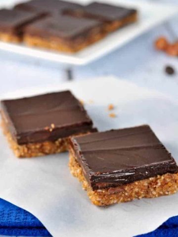 Chocolate Hazelnut Almond Butter Bars. Paleo.These no-bake bars are grain-free and dairy-free. Made with almond butter and maple syrup, they're vegan, too. |www.flavourandsavour.com