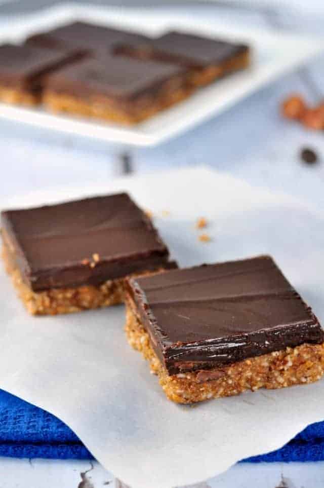Chocolate Almond Butter Bars. Paleo.These no-bake bars are grain-free and dairy-free. Made with almond butter and maple syrup, they're vegan, too. |www.flavourandsavour.com