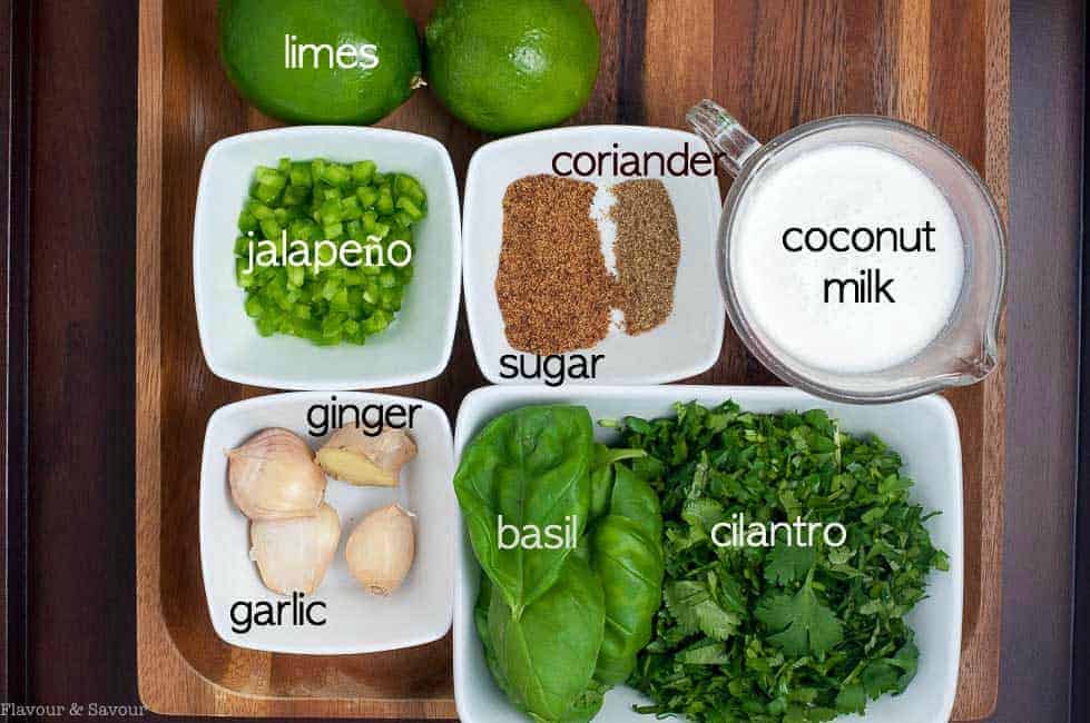 Ingredients for Thai Baked Chicken with coconut milk in small white containers