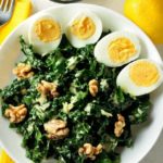 Super healthy Kale, Manchego Cheese and Walnut Salad with Eggs with a to-die-for dressing. A meal in a bowl. www.flavourandsavour.com