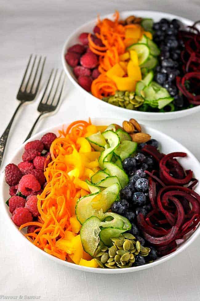 Rainbow Detox Salad. Raspberries, peppers, cucumber, blueberries and beets lined up in the colours of the rainbow.