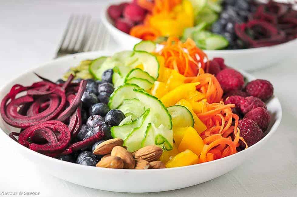 Rainbow Detox Salad. Raspberries, peppers, cucumber, blueberries and beets lined up in the colours of the rainbow.