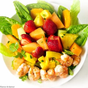 Southwestern Prawn Fruit Salad overhead view with grilled prawns, strawberries and melon