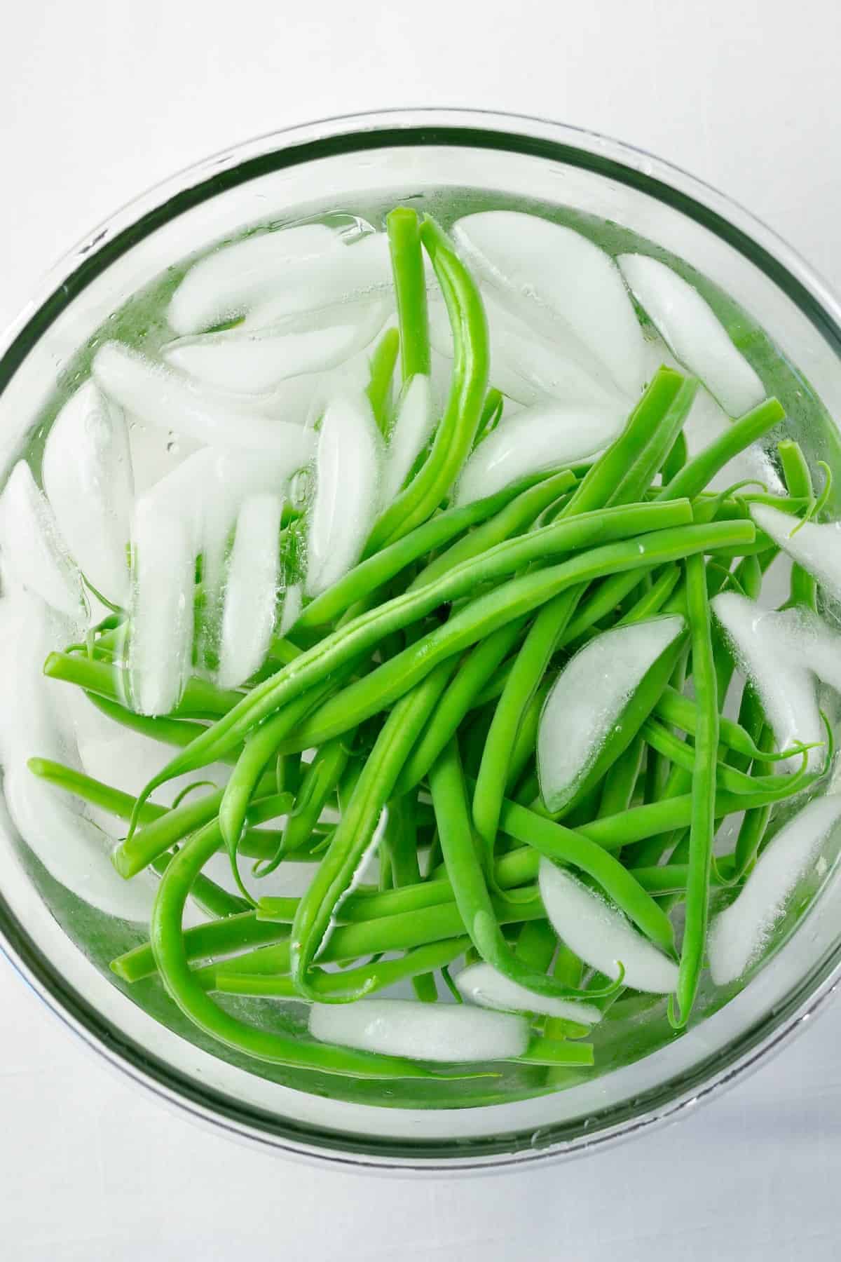 Green beans in ice water