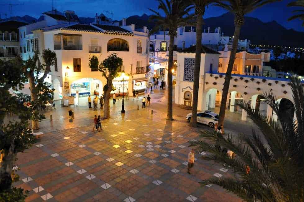 Hot Spanish nights call for Spicy Stuffed Peppers. Town square in Nerja, Spain