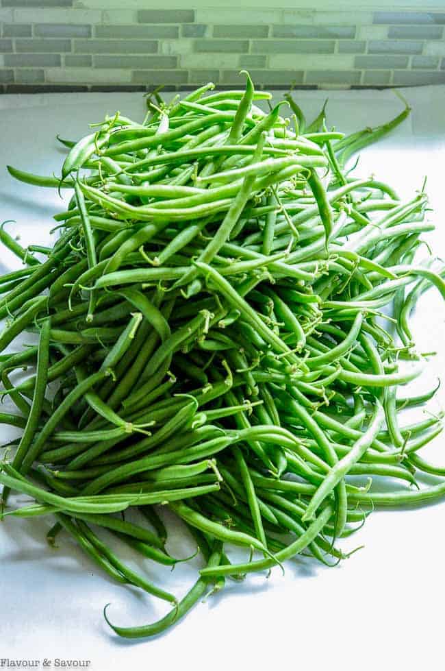 A large pile of fresh green beans