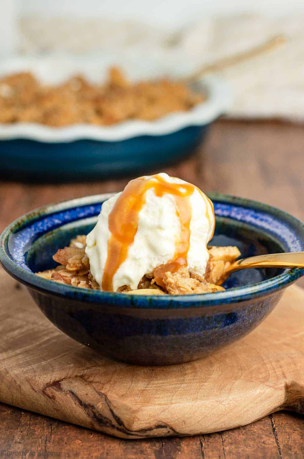 Apple crisp with ice cream and caramel sauce