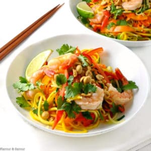 a bowl filled with Shrimp Pad Thai with fresh spiralized vegetables