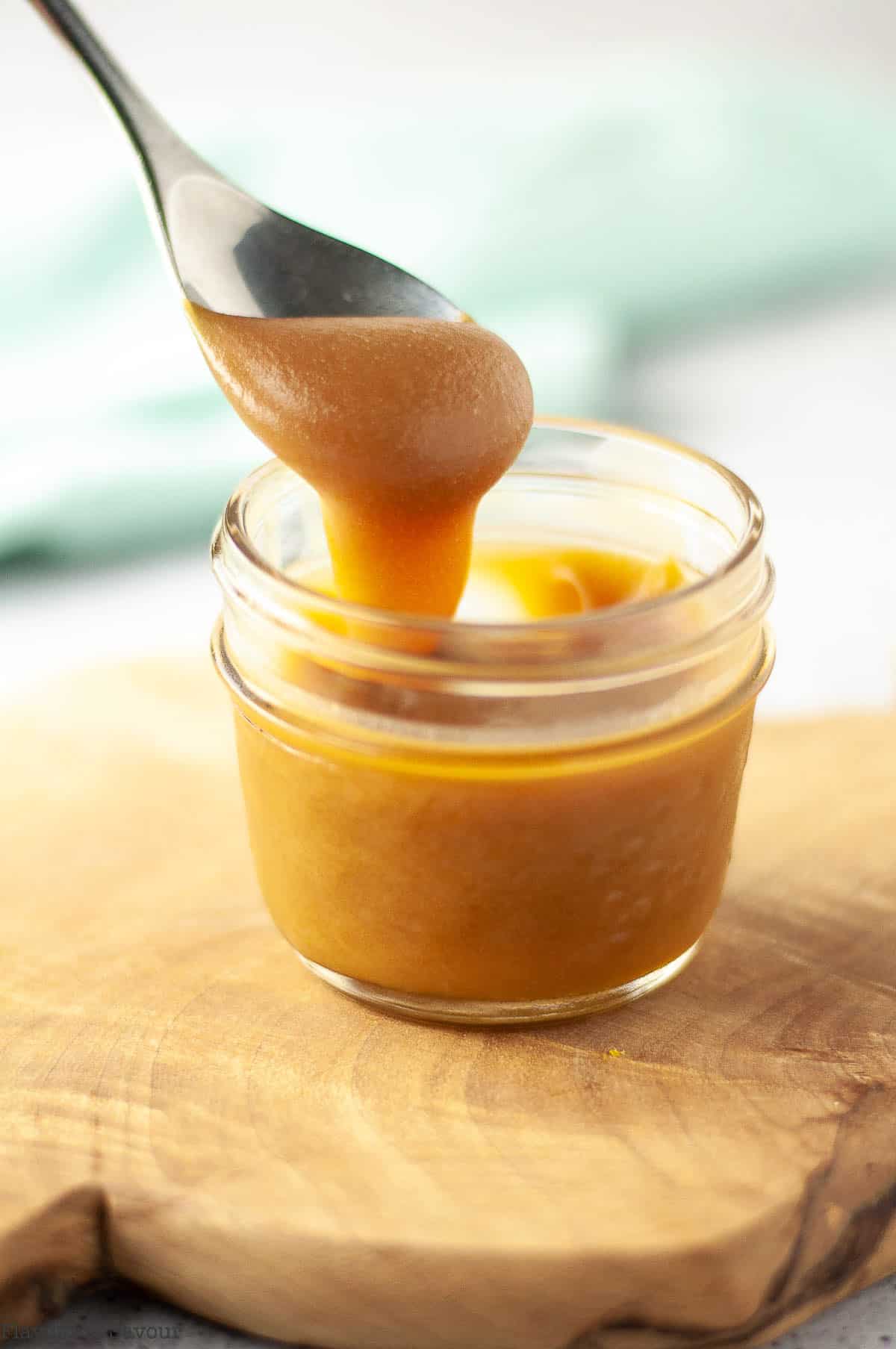 A spoonful of classic caramel sauce.