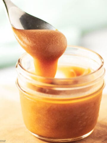 A spoonful of caramel sauce.