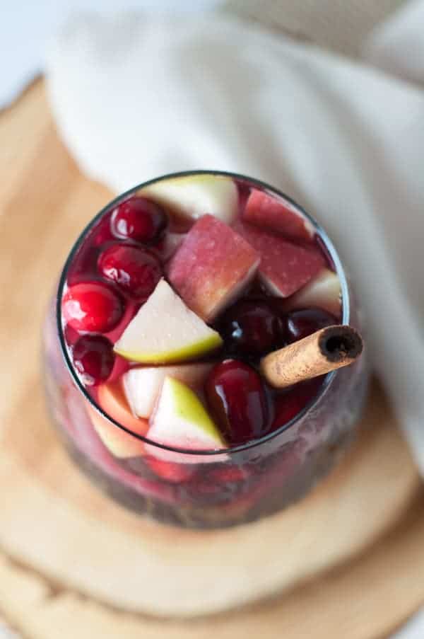 Cranberry Apple Cider Sangria. Perfect for fall celebrations!