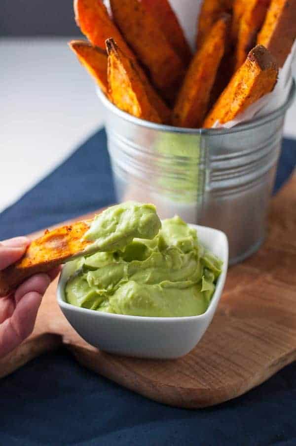 Smoky Sweet Potato Wedges that don't stick to the pan! Discover the secret to crispy fries and potato wedges and never have to scrape them off the pan again. Serve with avocado aioli. |www.flavourandsavour.com