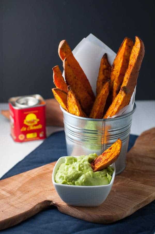 Smoky Sweet Potato Wedges in a round metal can with aioli in a small white dish.