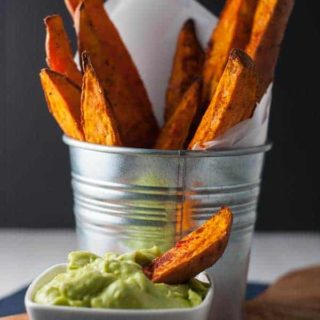 Smoky Sweet Potato Wedges that don't stick to the pan! Discover the secret to crispy fries and potato wedges and never have to scrape them off the pan again. Serve with avocado aioli. |www.flavourandsavour.com