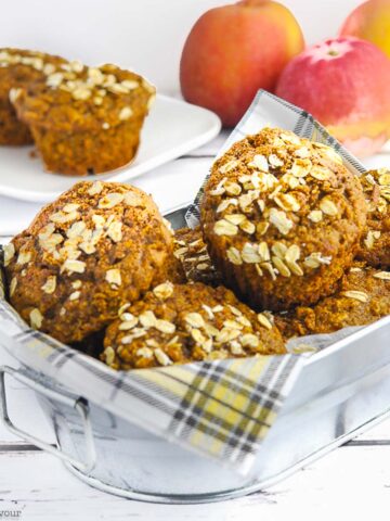 a basket of gluten-free apple muffins