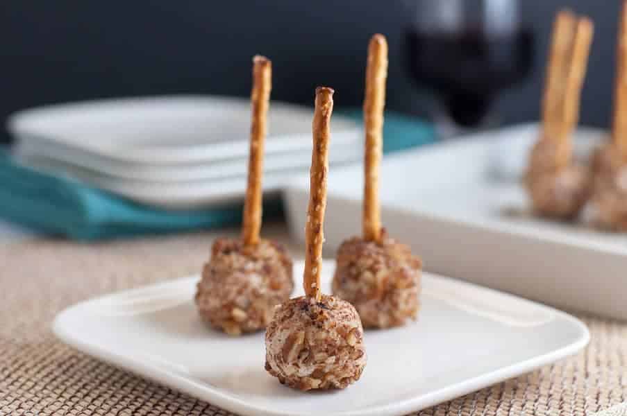 Mini Goat Cheese Balls on a Stick! Bite-sized appetizer made with goat cheese, pecorino cheese, cranberries and pecans. Party food!