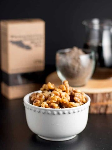 Maple Glazed Walnuts with Smoked Sea Salt add a healthy crunch to your salads. Just 3 ingredients and 3 minutes to make.