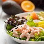 Citrus Avocado Salad with Baby Shrimp and Smoky Vinaigrette. A healthy salad full of kale, romaine, citrus fruits, avocado and optional shrimp, all tossed with a smoky vinaigrette.