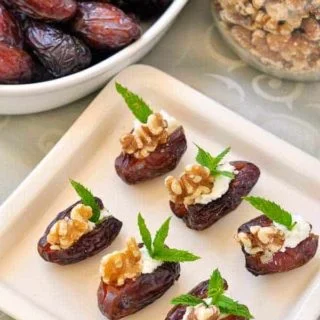 Soft and sweet Medjool Dates Stuffed with Creamy Goat Cheese, Toasted Walnuts and Fresh Mint