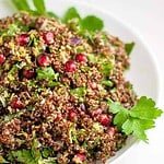 Festive Red Quinoa Tabouli with Pomegranate. A twist on traditional tabouli, this recipe uses red quinoa instead. A healthy salad flavoured with lemon.
