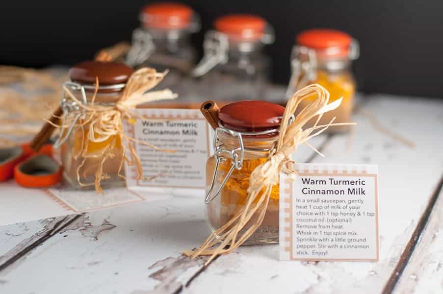 Warm Turmeric Cinnamon Spice Mix in jars with gift tags