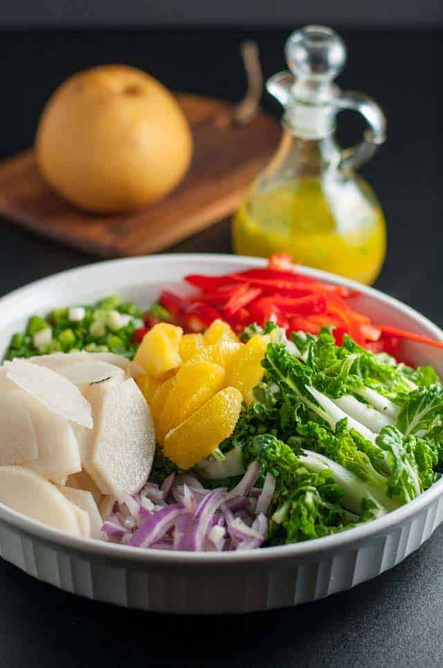 Baby Bok Choy Salad with Ginger-Orange Dressing. Add some color to your diet with this healthy salad made with tender baby bok toy, Asian pear, oranges and peppers. Drizzle it all with a ginger-orange dressing.
