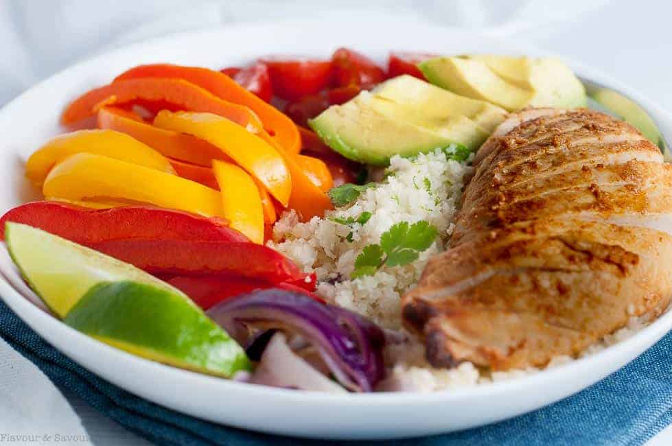 close up view of a bowl with Fajita Chicken, veggies and cauliflower rice