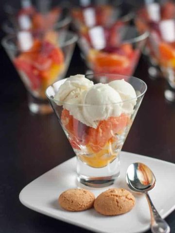 Easy Italian Dessert with Lightly Salted Citrus Fruit, Vanilla Bean Gelato and Crumbled Amaretti Cookies. This pretty, make-ahead and simple to assemble and oh-so-good!