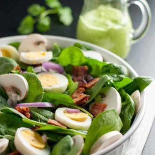 Classic Spinach Salad with Creamy Avocado Dressing. Love spinach salad but hate the high-fat buttermilk dressing? Try this updated paleo spinach salad with creamy dairy-free avocado dressing.
