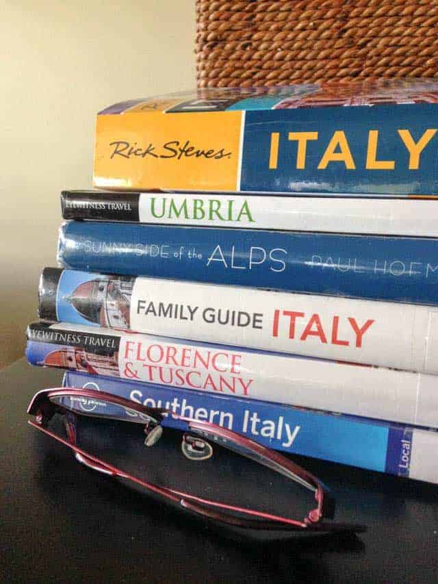 Stack of travel books for Italy