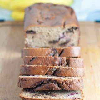 Chocolate Swirl Banana Bread with Raspberries. Grain-free, naturally sweetened banana bread. Rises beautifully,holds it shape, is moist, chocolatey and delicious!