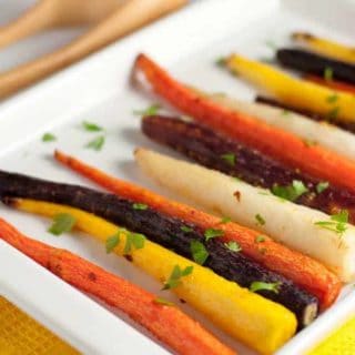 Easy Roasted Carrots with Honey-Ginger Glaze. A quick and easy side dish with bright flavours from fresh ginger and chili flakes.