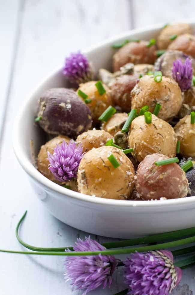 Springtime Potato Salad with Lemon Tahini Dressing. A healthy mayo-free potato salad made with baby potatoes, capers, dill and Dijon!