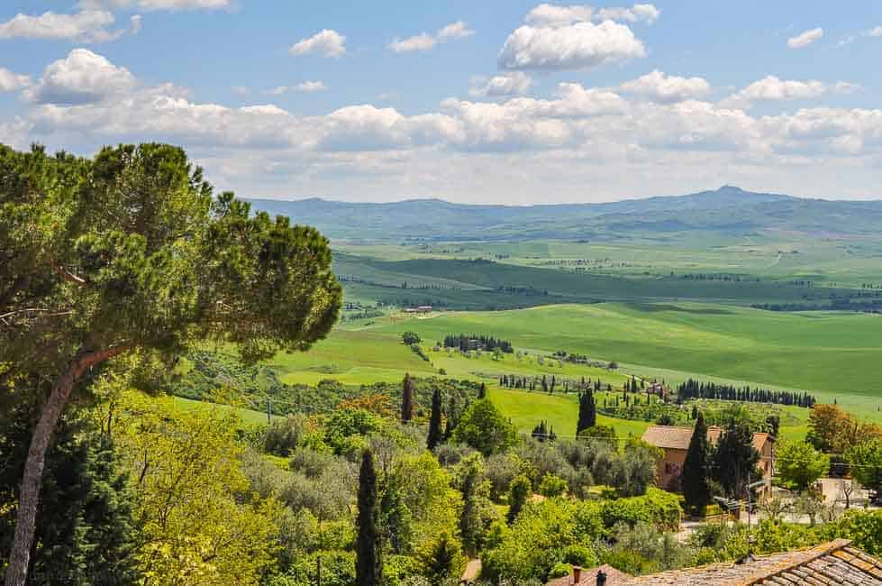 Tuscan hillside panorama, one of the spectacular sights to see while driving in Italy