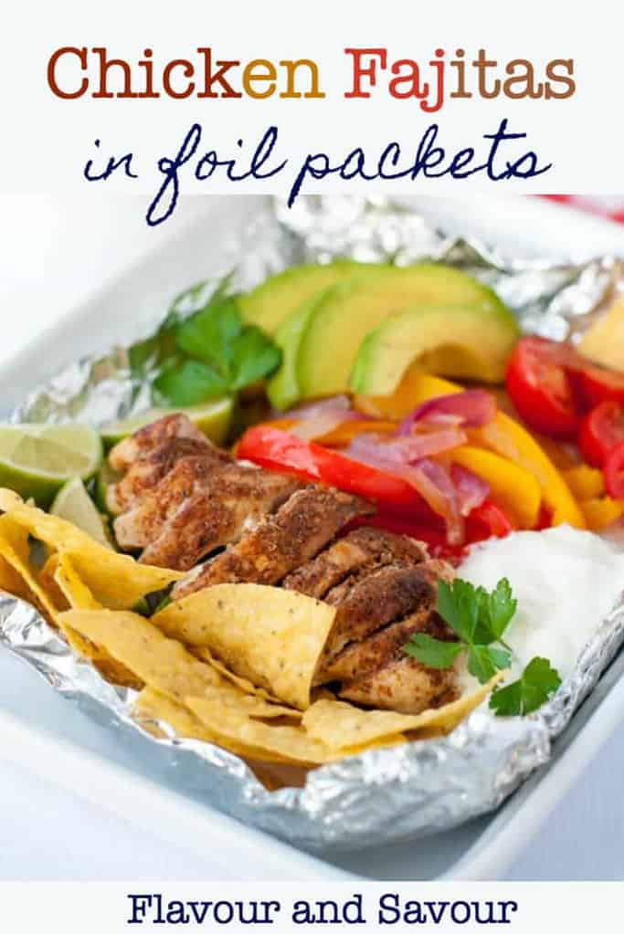 Easy Chicken Fajitas in Foil Packets with coloured peppers, avocado and tomatoes.