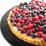 Gluten-Free Fruit Flan with Ricotta and Berries. Tender cake base topped with lightly sweetened ricotta cheese and honey-drizzled fresh berries. |www.flavourandsavour.com