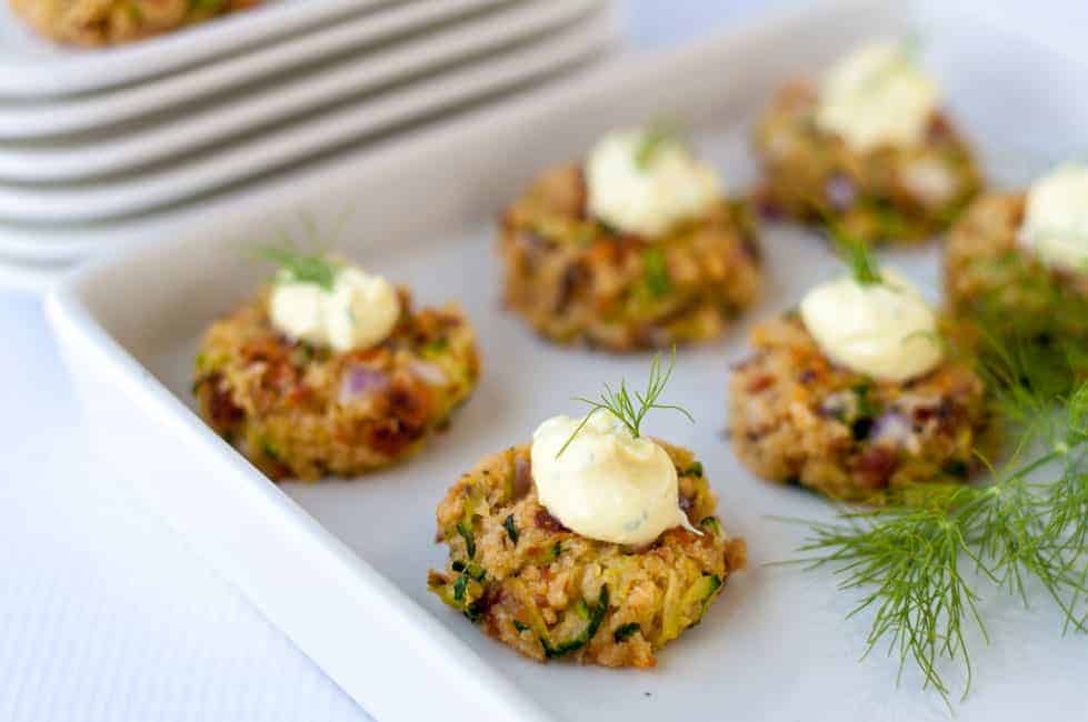 These Smoked Salmon Zucchini Cakes with Lemon Dill Dip make a healthy savoury appetizer. They're baked, not fried! Crispy little fritters with a piquant dip. |www.flavourandsavour.com