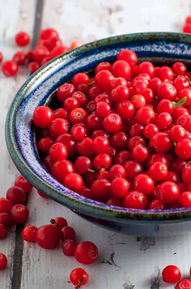 A bowl of huckleberries for Wild Huckleberry Mint Mohito Mocktail 