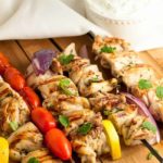 Easy Greek Lemon Chicken Kabobs with Tzatziki Sauce. Succelent juicy chicken marinated in a Meditteranean marinade of lemon and herbs. Perfect for grilling year round. |www.flavourandsavour.com