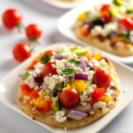 This Greek Salad Mini Flatbread with Tzatziki makes a healthy, fresh veggie-packed, flavourful accompaniment to dinner. It's a breeze to prep!|www.flavourandsavour.com